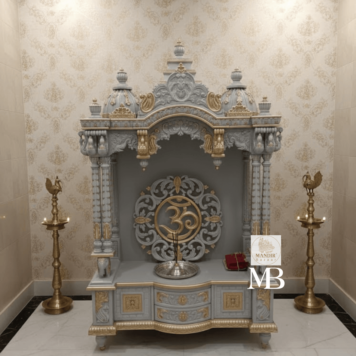 White and gold hand carved wooden mandir for home with Om design and storage cabinet