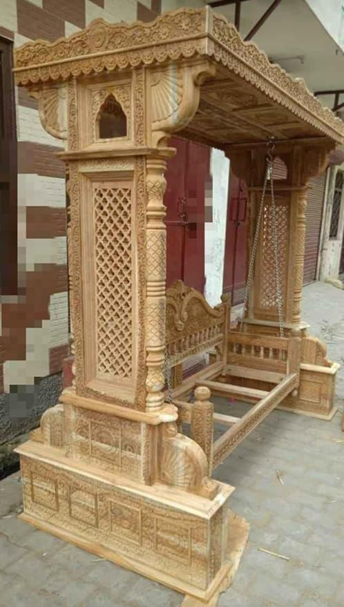 Carved teak wood swing with comfortable mattress