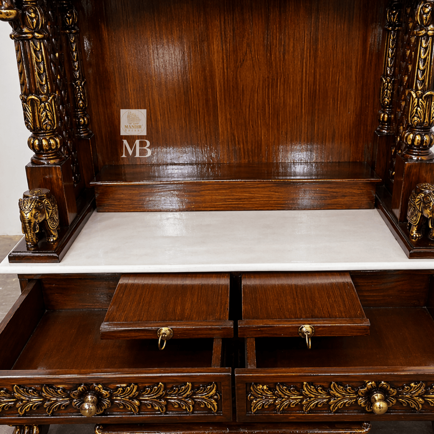 teak wood pooja mandir with hand carved details and storage drawers