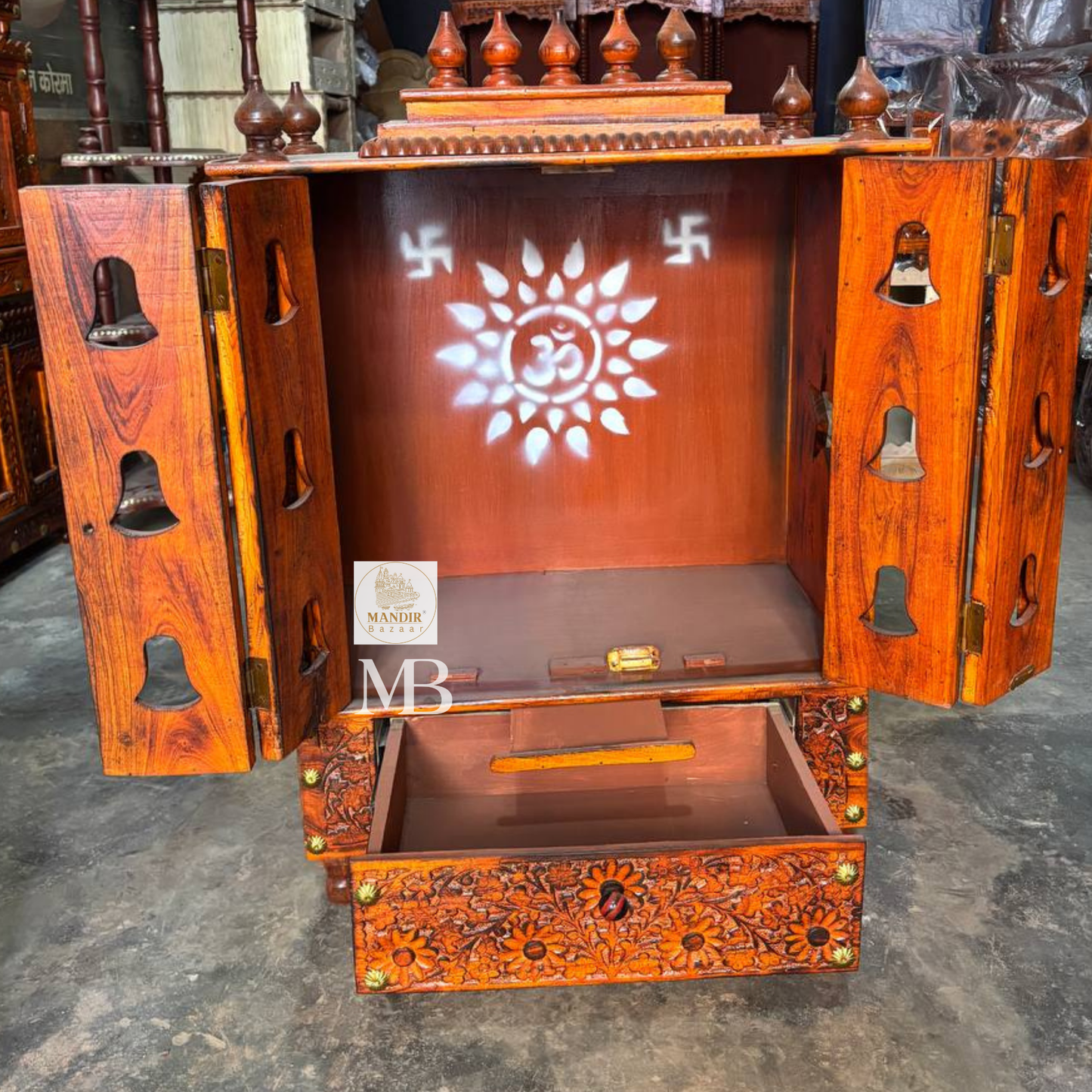 Decorative wooden bell mandir with intricate floral carvings for home