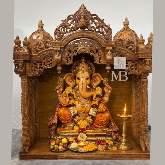 Handcrafted wooden pooja mandir for home with intricate traditional carvings