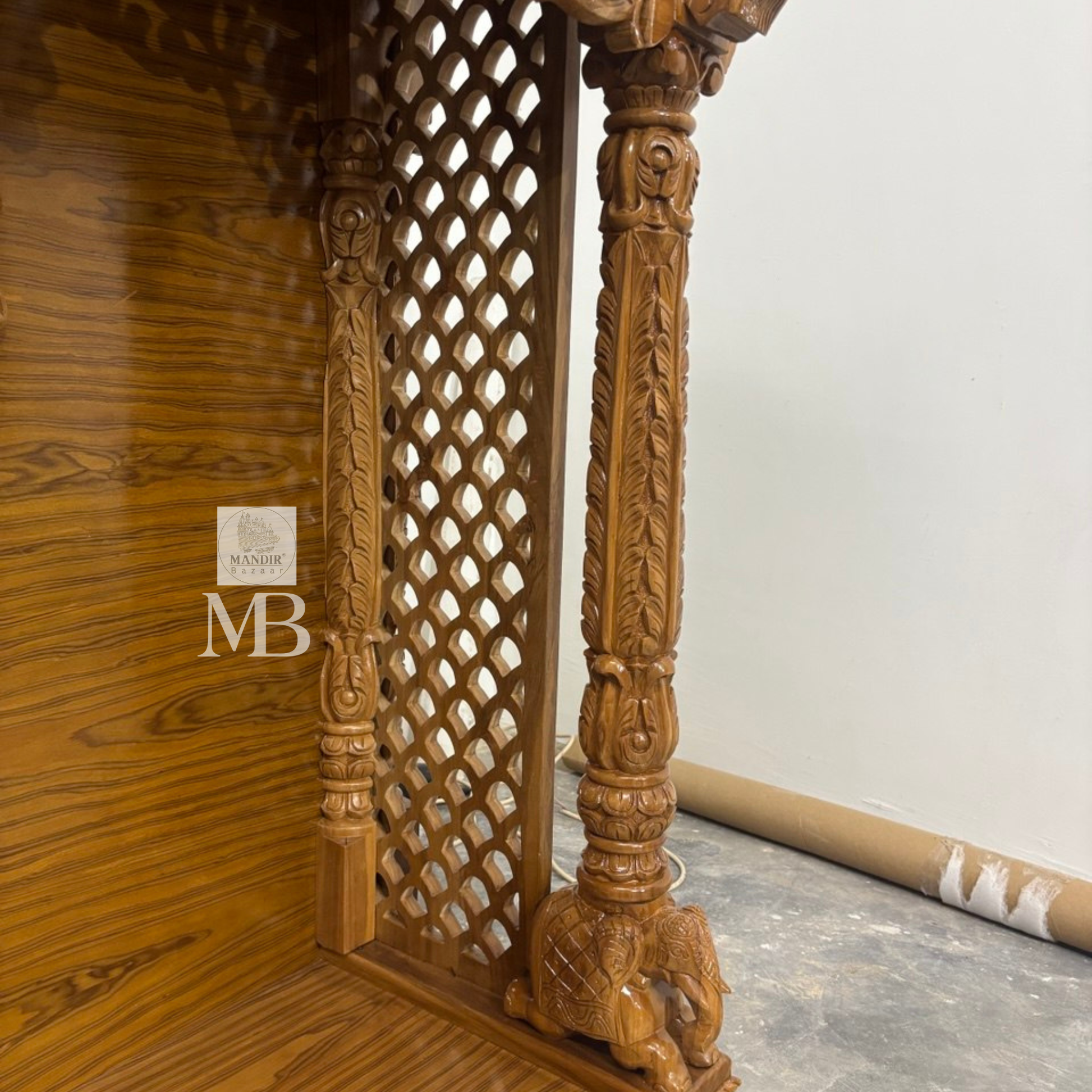 Handcrafted wooden pooja mandir for home with intricate traditional carvings