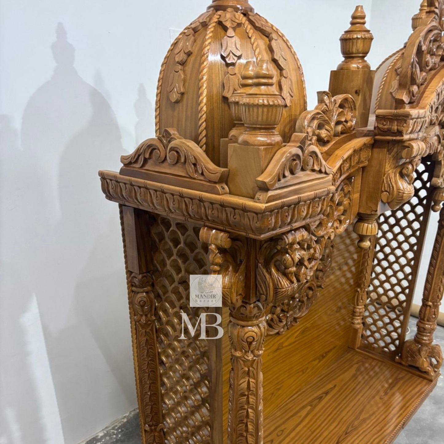 Handcrafted wooden pooja mandir for home with intricate traditional carvings