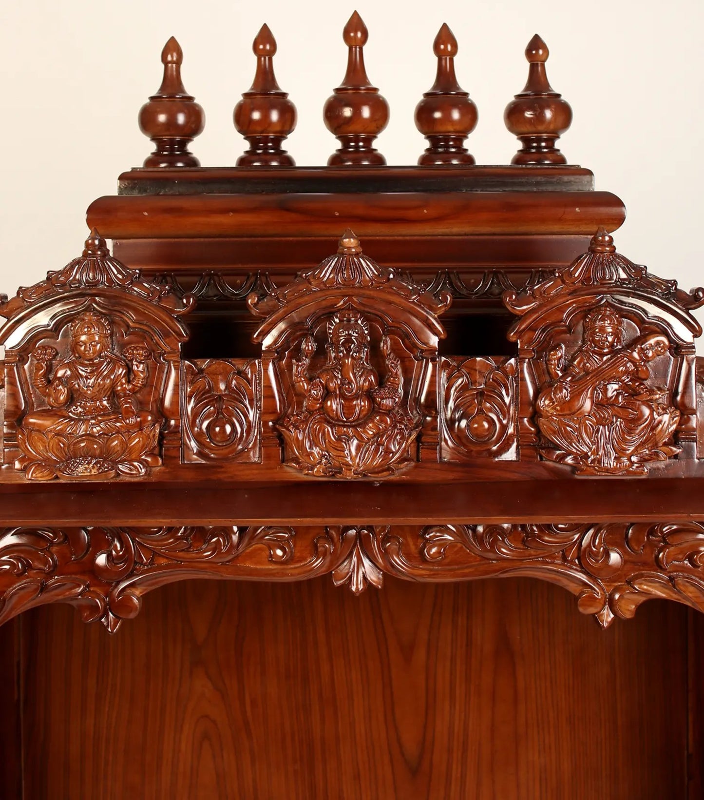 Handcrafted wooden temple with Lakshmi Ganesha Saraswati carving