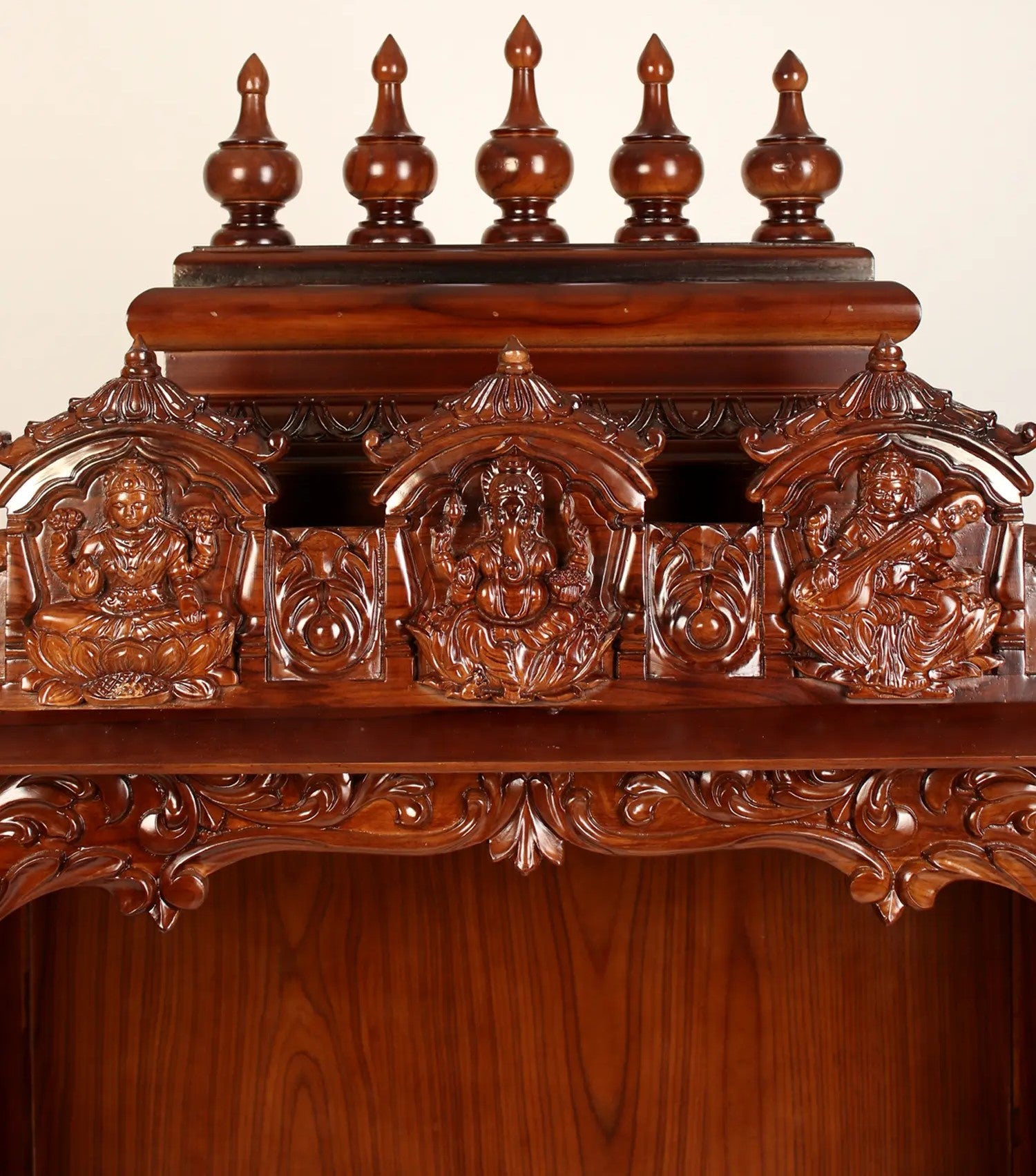 Handcrafted wooden temple with Lakshmi Ganesha Saraswati carving
