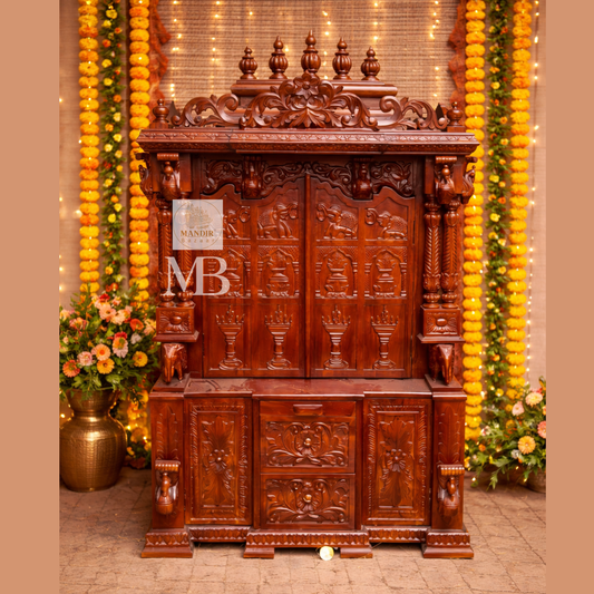 6 feet hand carved wooden pooja mandir with traditional floral carvings, elephant motifs, carved doors and storage drawers for home