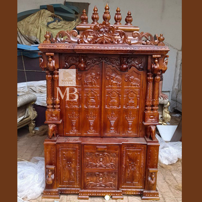 6 feet hand carved wooden pooja mandir with traditional floral carvings, elephant motifs, carved doors and storage drawers for home