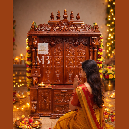 6 feet hand carved wooden pooja mandir with traditional floral carvings, elephant motifs, carved doors and storage drawers for home