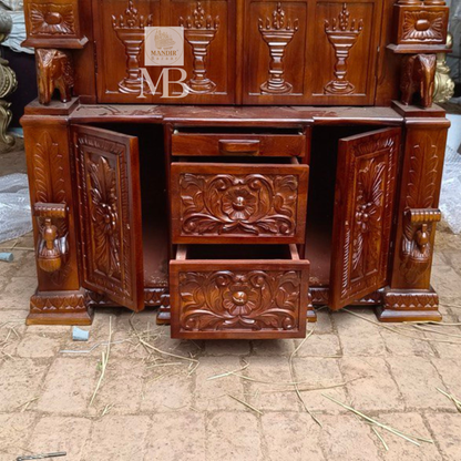 6 feet hand carved wooden pooja mandir with traditional floral carvings, elephant motifs, carved doors and storage drawers for home