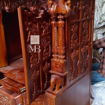 6 feet hand carved wooden pooja mandir with traditional floral carvings, elephant motifs, carved doors and storage drawers for home
