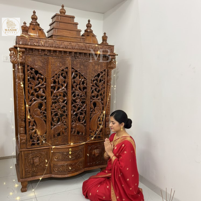 6 ft enclosed wooden pooja mandir with decorative doors and storage drawers