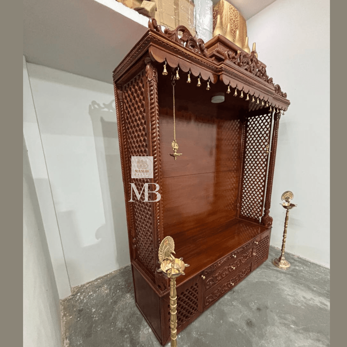Handcrafted wooden home temple with two hanging brass diyas and two standing brass diyas included with purchase