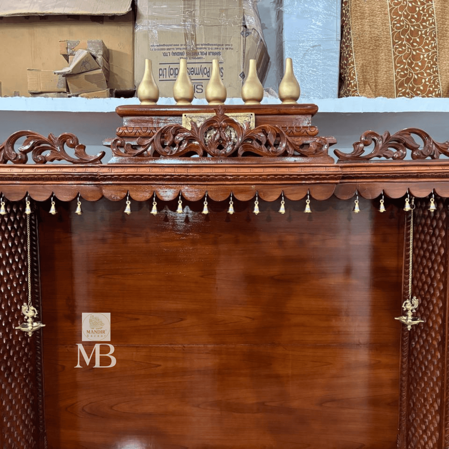 Handcrafted wooden home temple with two hanging brass diyas and two standing brass diyas included with purchase
