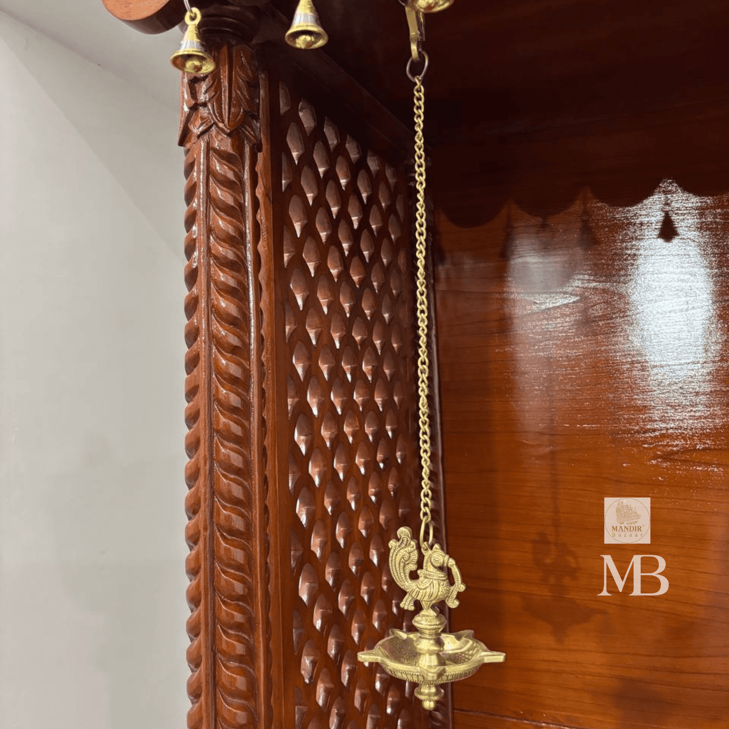Handcrafted wooden home temple with two hanging brass diyas and two standing brass diyas included with purchase