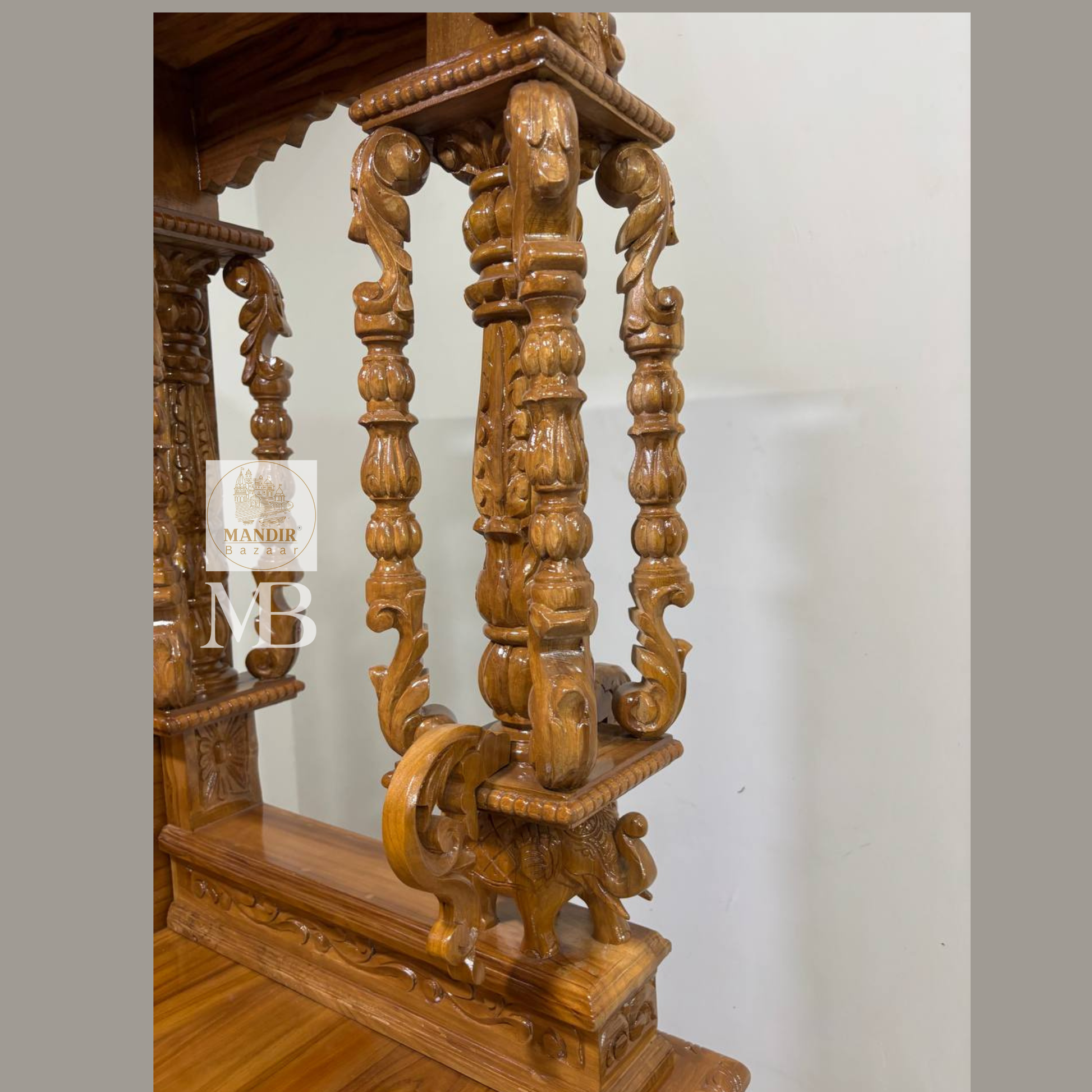 Wooden pooja mandir with multiple storage drawers and cabinet