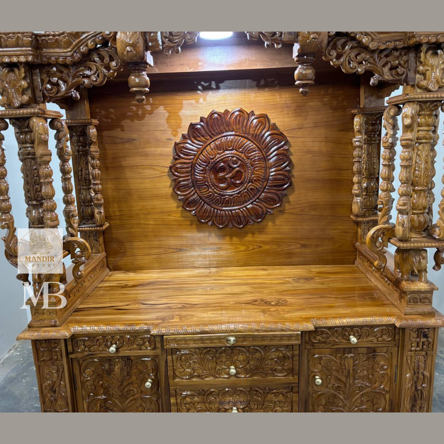 Wooden pooja mandir with multiple storage drawers and cabinet