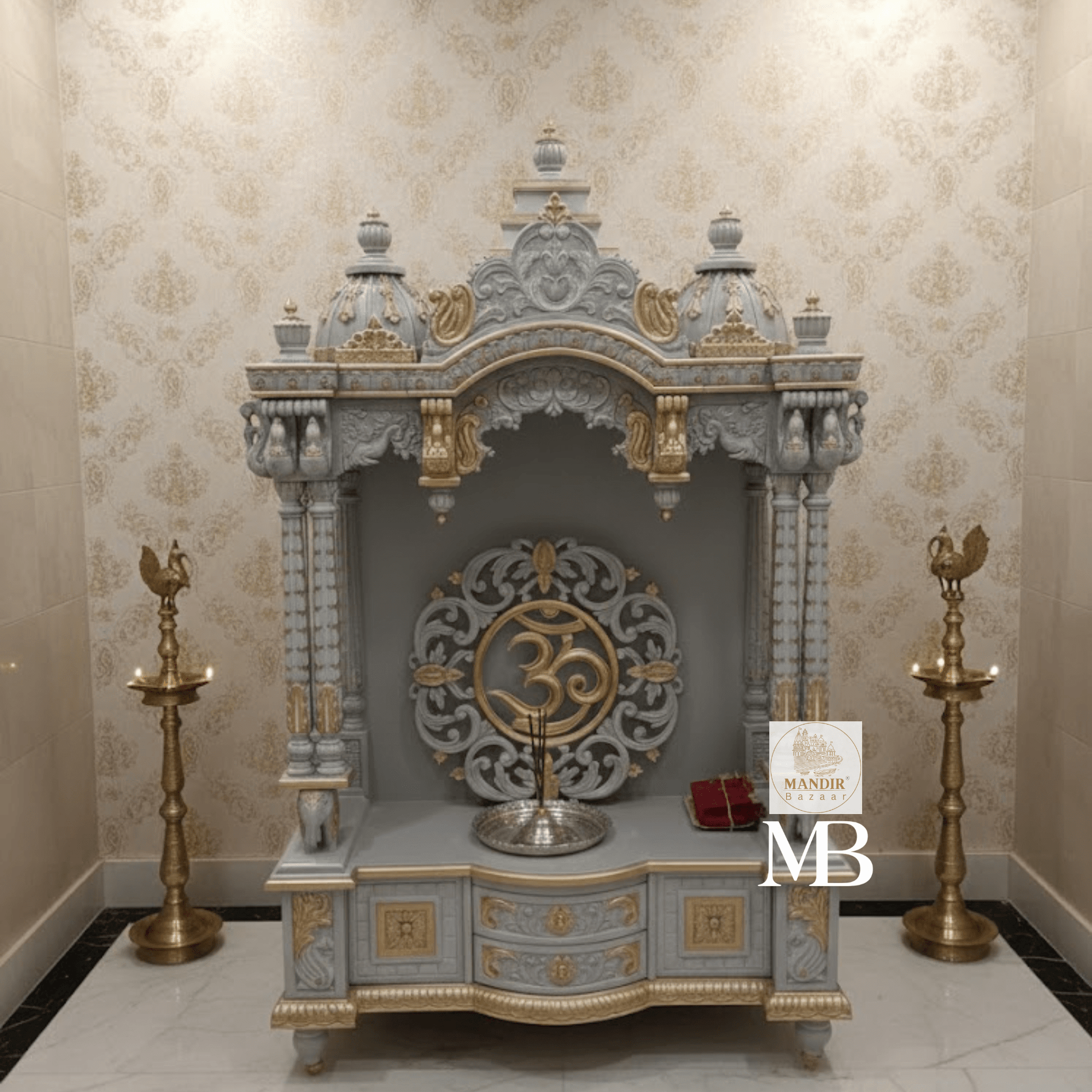 White and gold hand carved wooden mandir for home with Om design and storage cabinet