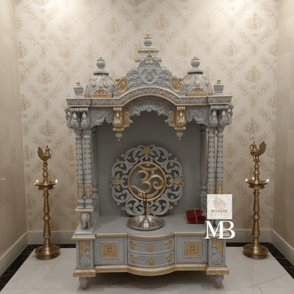 White and gold hand carved wooden mandir for home with Om design and storage cabinet