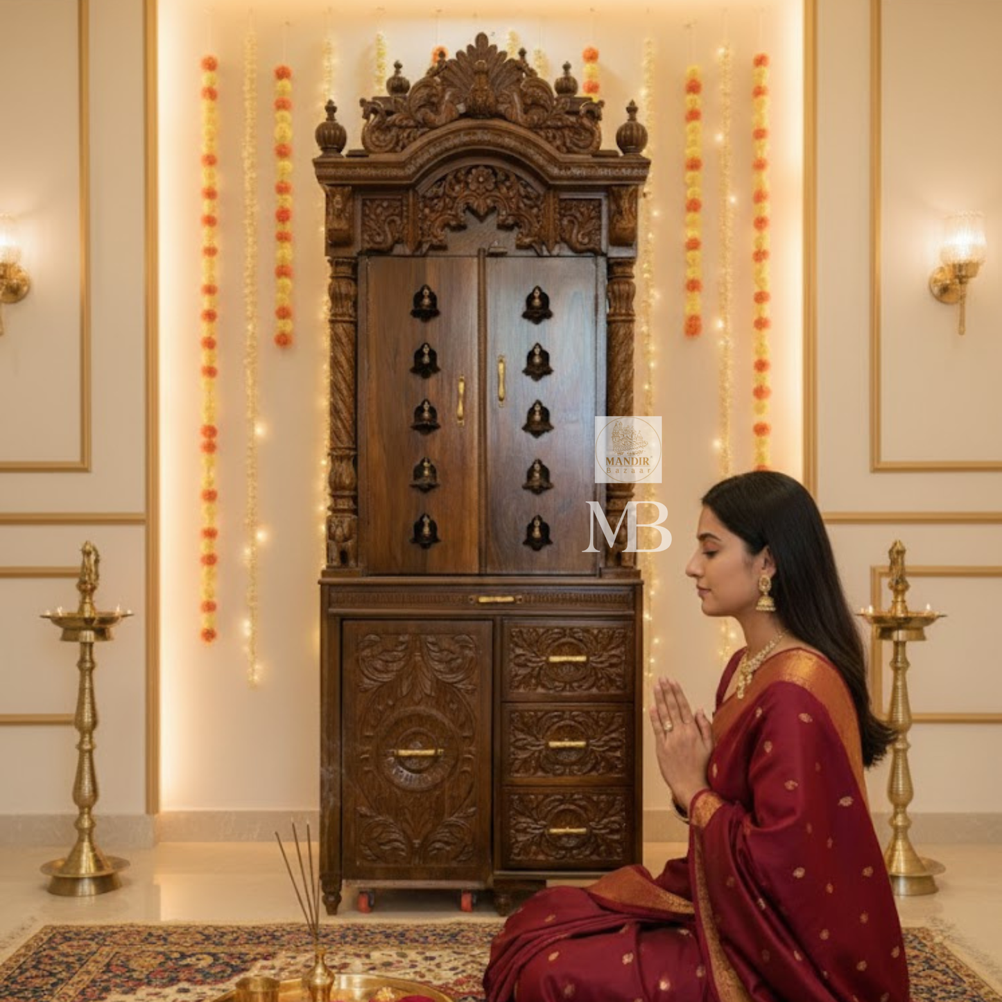 Luxury handcrafted solid teak wood pooja mandir with brass bells, carved pillars, storage cabinet, three drawers, walnut brown finish, traditional Hindu temple for home by Mandir Bazaar.