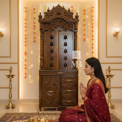 Luxury handcrafted solid teak wood pooja mandir with brass bells, carved pillars, storage cabinet, three drawers, walnut brown finish, traditional Hindu temple for home by Mandir Bazaar.