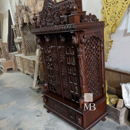 Side angle view showing diamond lattice jali side wall and twisted pillars of Sheesham wood temple