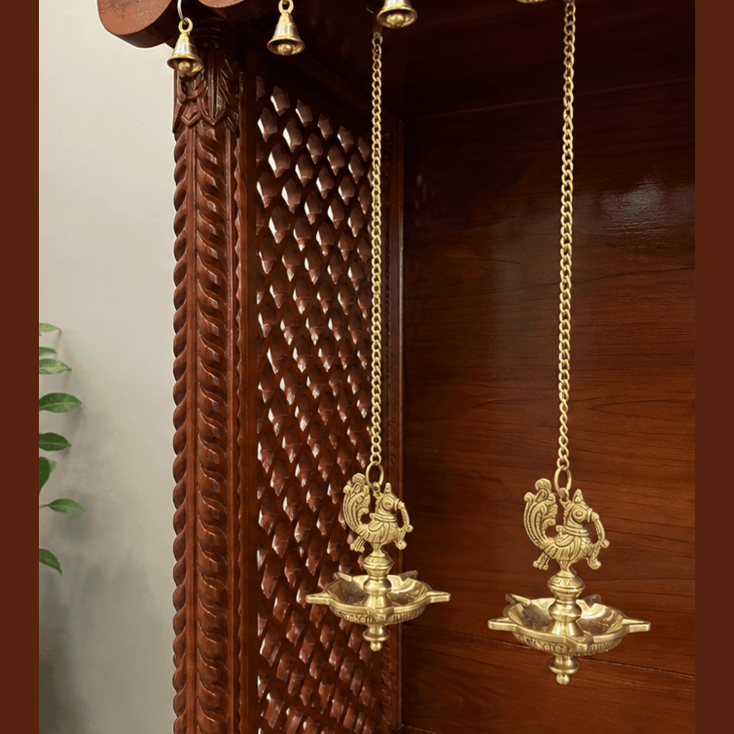 Brass hanging diya pair with peacock design and chain for home temple