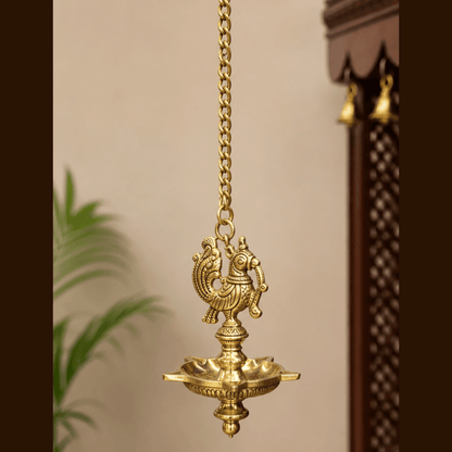 Peacock design brass hanging oil lamp for home temple