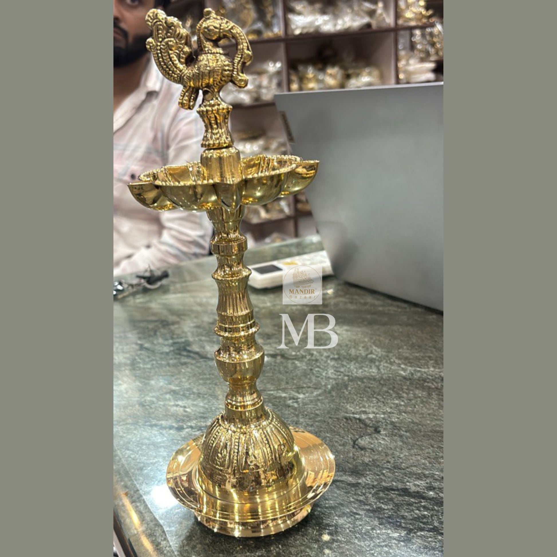 Brass peacock standing diya pair for home temple