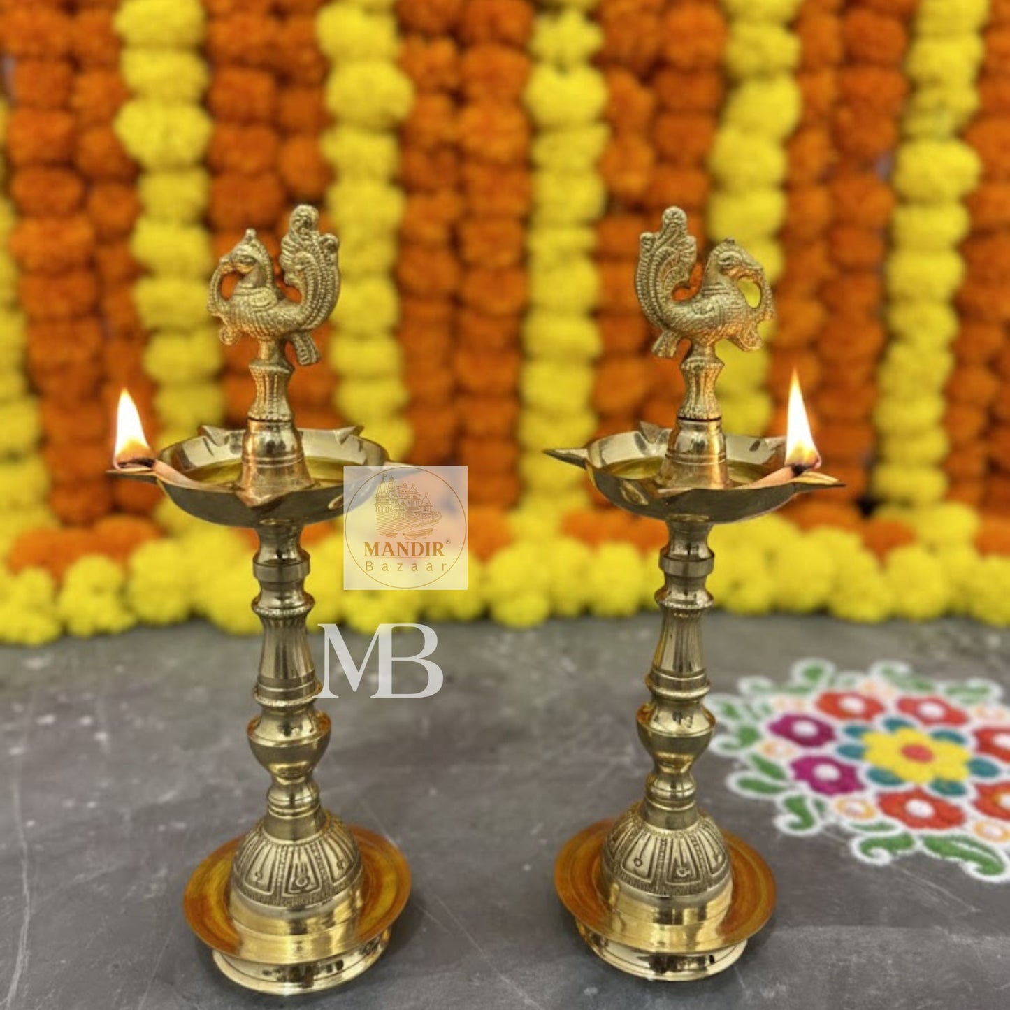 Traditional brass oil lamps with peacock design for pooja
