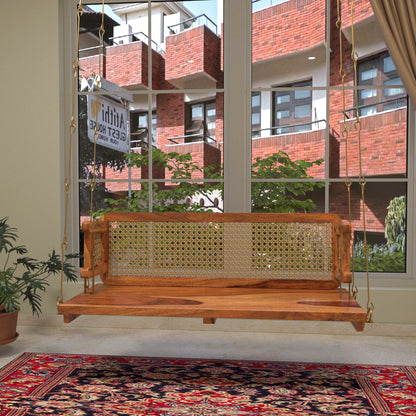 Handmade cane back wooden jhula with classic Indian design