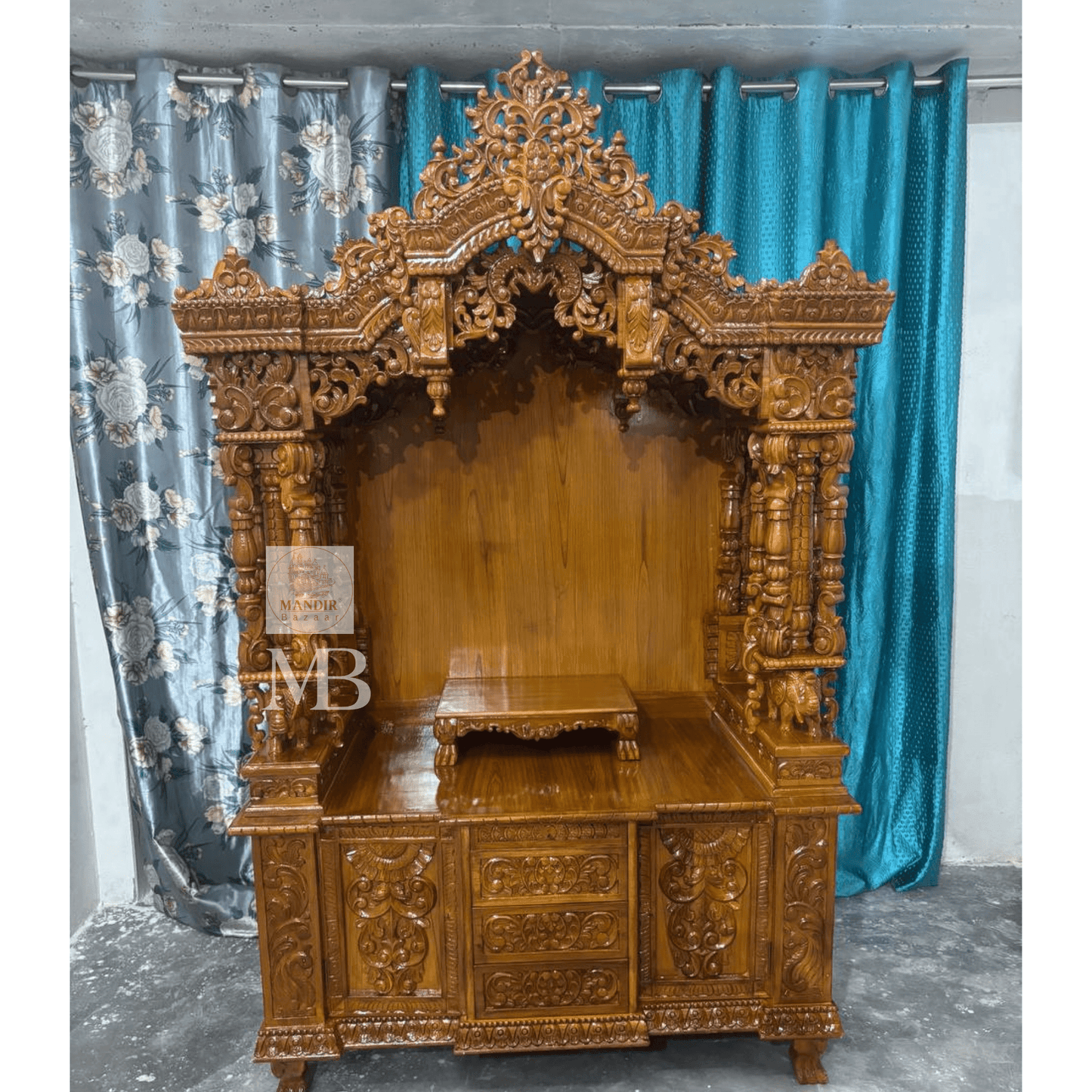 Intricate carved wooden mandir crown with traditional floral detailing