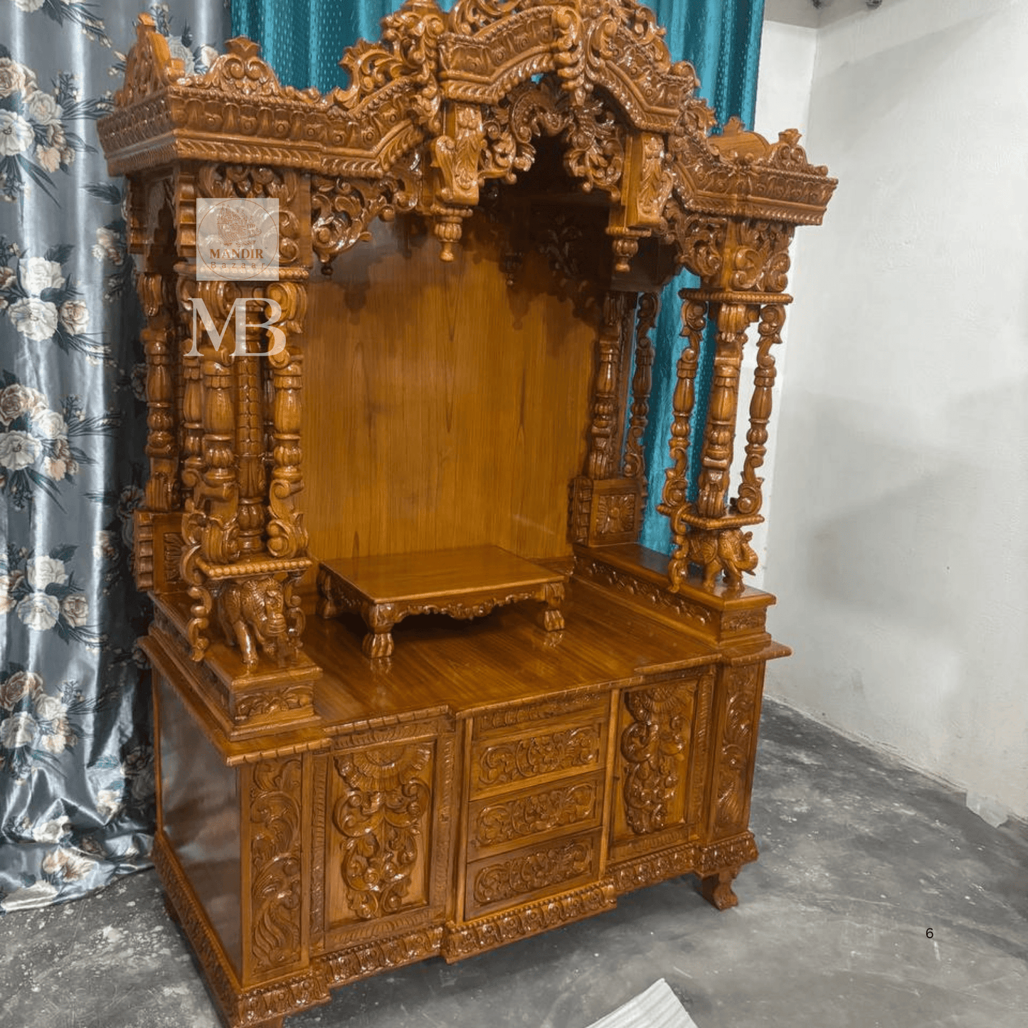 Intricate carved wooden mandir crown with traditional floral detailing