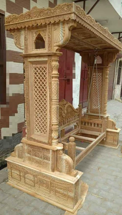 Carved teak wood swing with comfortable mattress