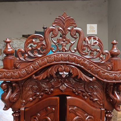 Hand carved wooden mandir for home with enclosed doors and storage cabinet