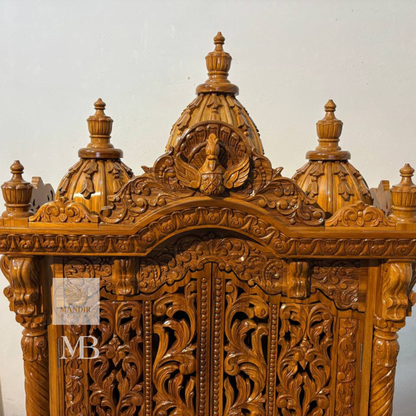Hand carved wooden mandir for home with traditional shikhar and storage cabinet