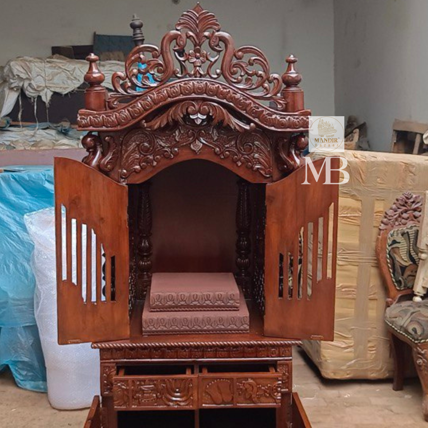 Hand carved wooden mandir for home with enclosed doors and storage cabinet