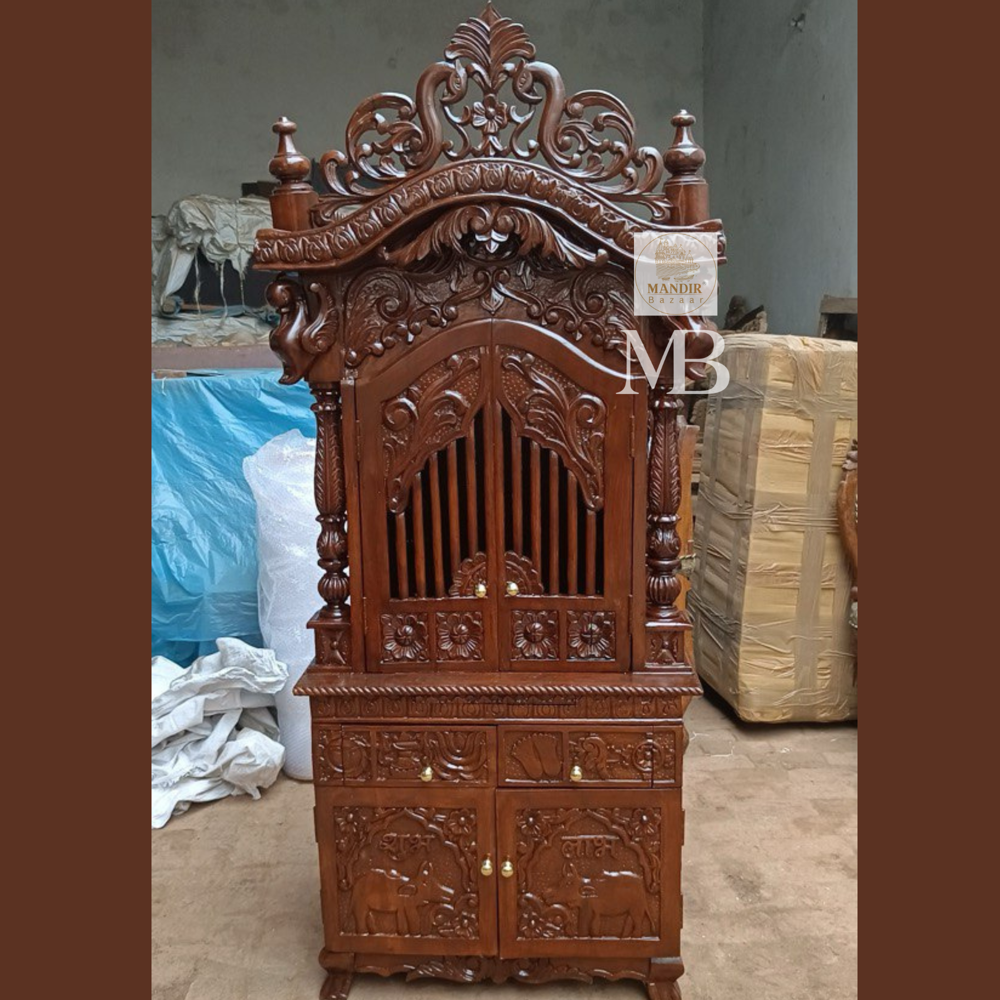Hand carved wooden mandir for home with enclosed doors and storage cabinet