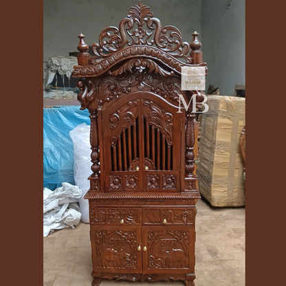 Hand carved wooden mandir for home with enclosed doors and storage cabinet