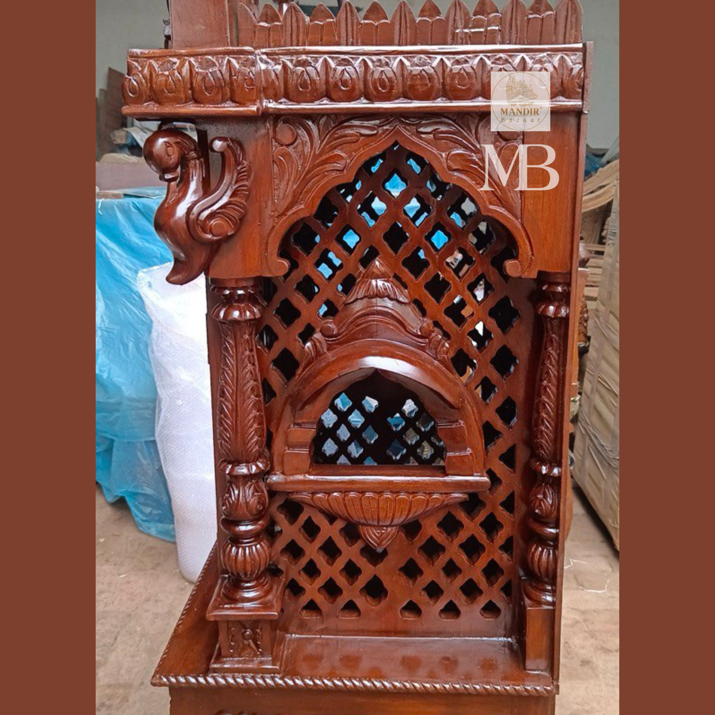 Hand carved wooden mandir for home with enclosed doors and storage cabinet