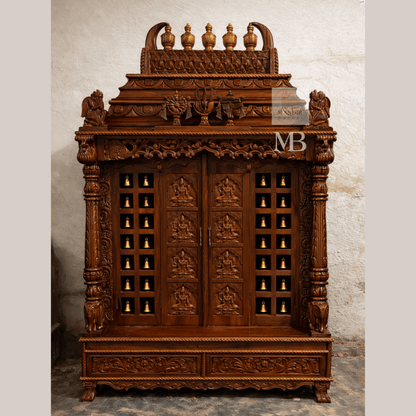 6 feet hand carved wooden pooja mandir with ornate crown, carved deity doors, decorative bells, pillars and storage drawers