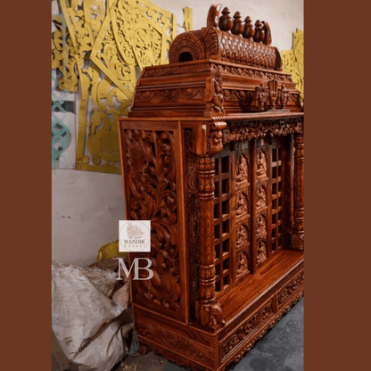 Hand carved wooden pooja mandir doors featuring multiple detailed devotional deity panels
