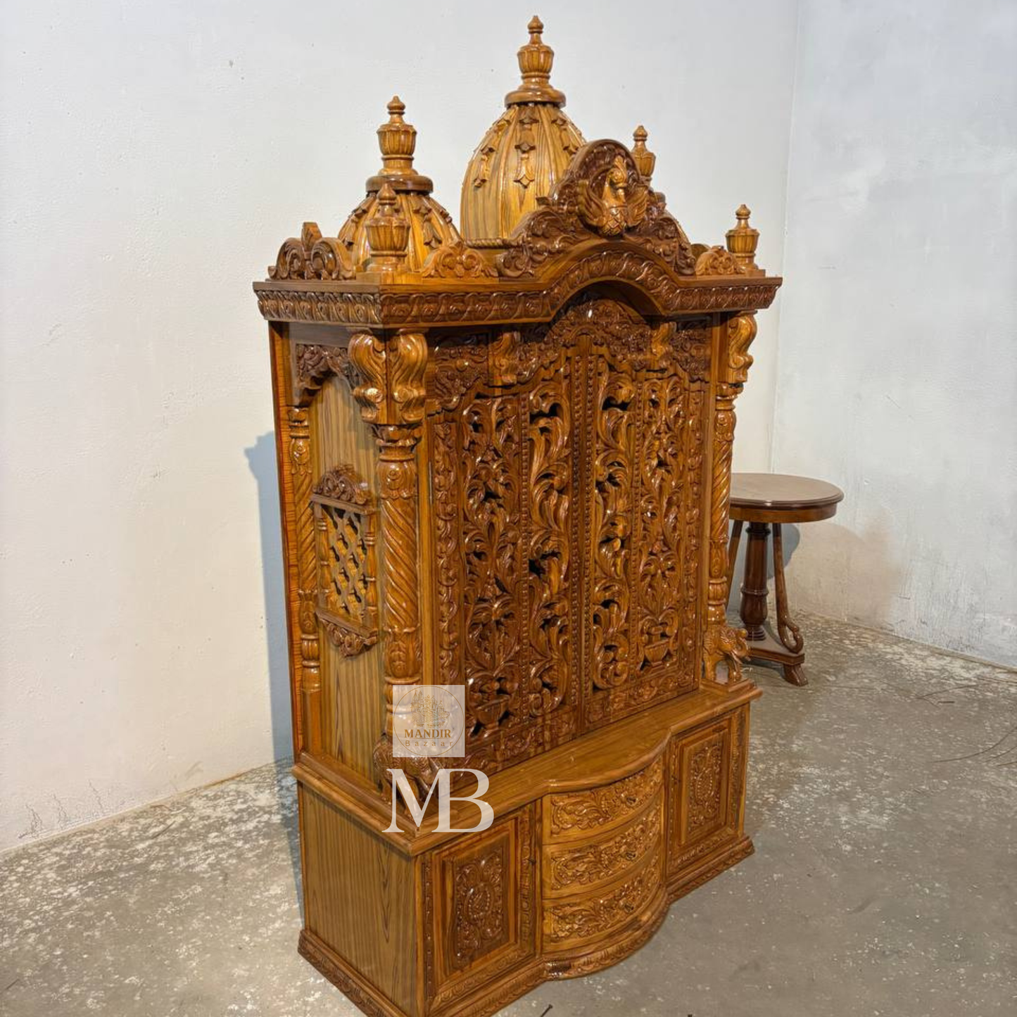 Hand carved wooden mandir for home with traditional shikhar and storage cabinet