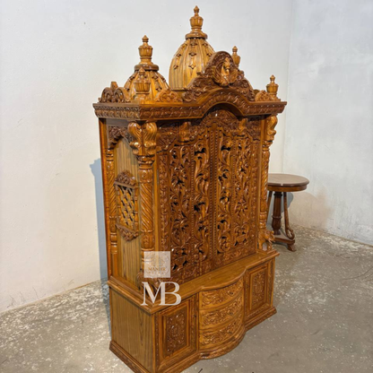 Hand carved wooden mandir for home with traditional shikhar and storage cabinet