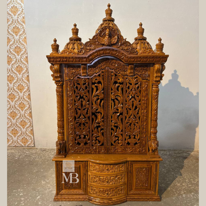 Hand carved wooden mandir for home with traditional shikhar and storage cabinet