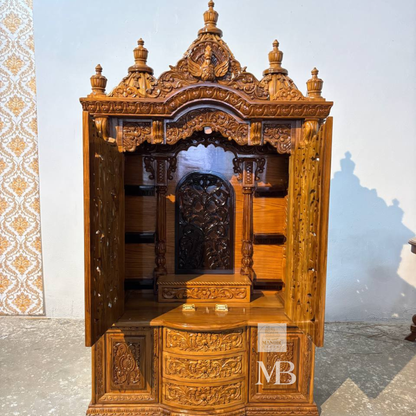 
Hand carved wooden mandir for home with traditional shikhar and storage cabinet