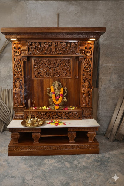 Hand carved wooden pooja mandir with intricate floral carvings, deity figures, marble-look platform and warm LED lights
