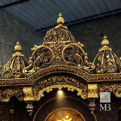 Dark wood pooja temple with intricate antique gold carving