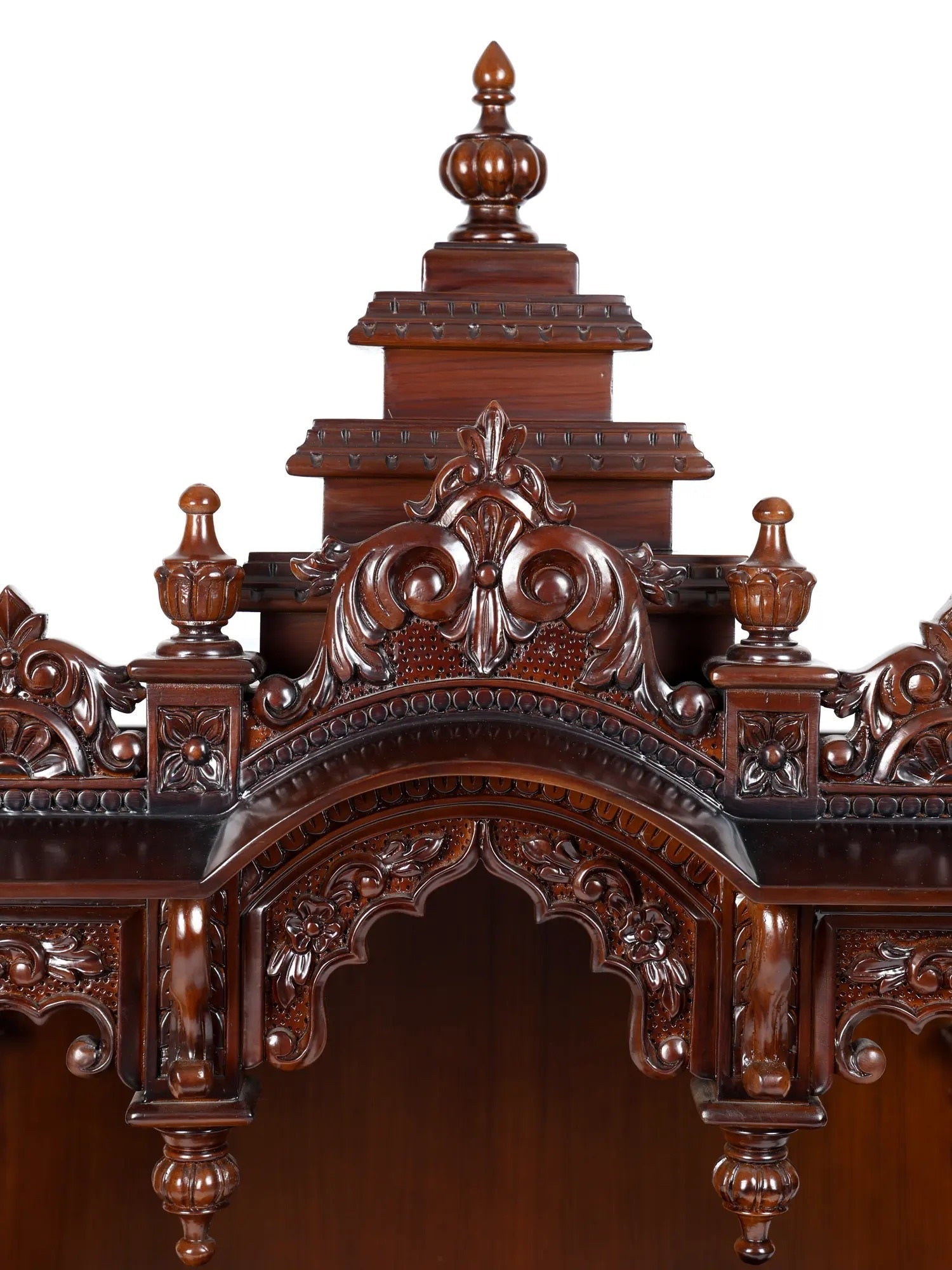 Hand carved wooden pooja mandir with traditional Indian craftsmanship