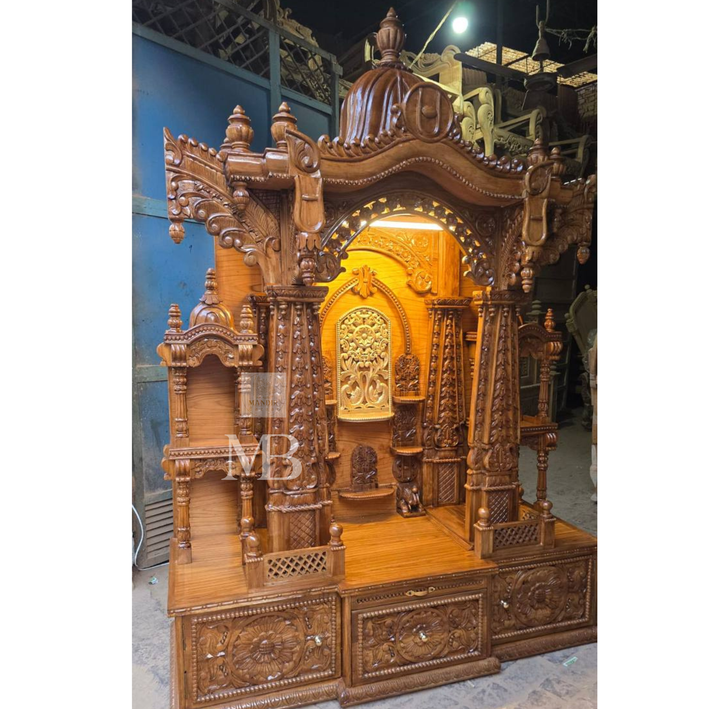 Handcrafted wooden Hindu temple with detailed carved pillars