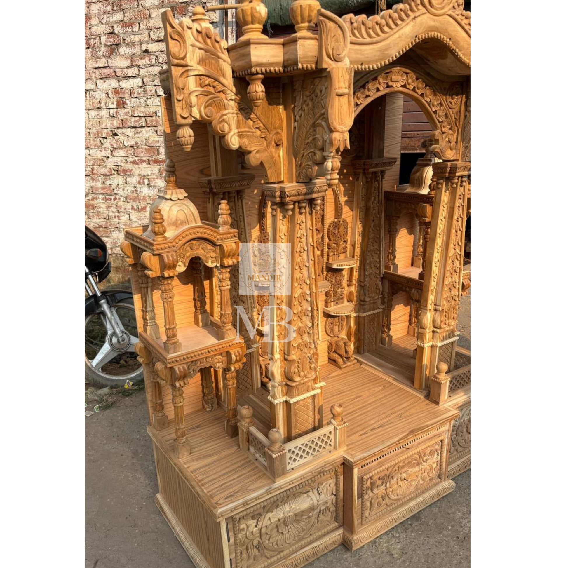 Luxury wooden pooja mandir with ornate traditional craftsmanship